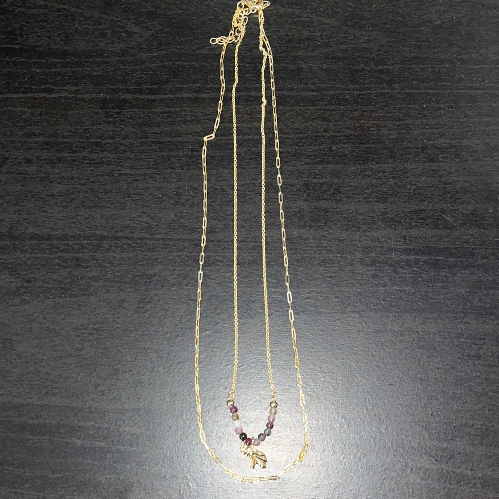 Elegant Gold Necklace with Purple Accents
